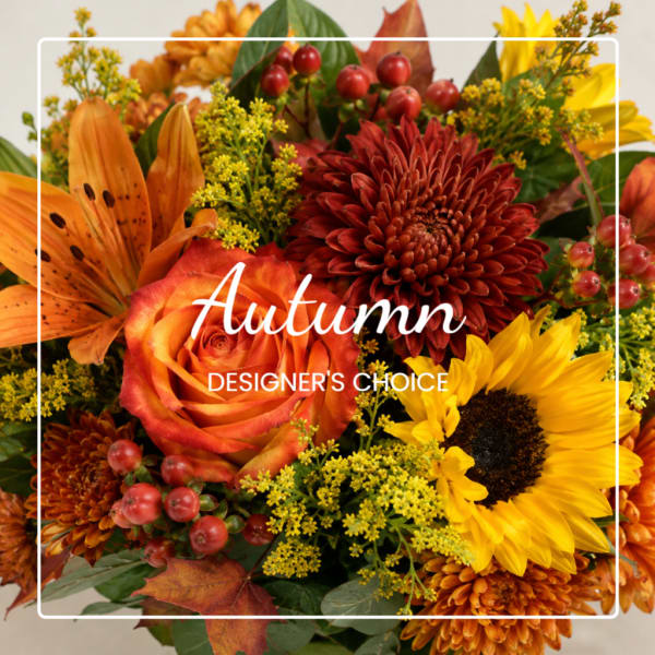 Autumn bouquet with roses, sunflowers, and chrysanthemums