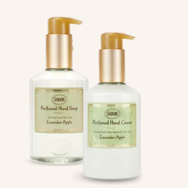 Two pump bottles of lavender apple hand soap and cream