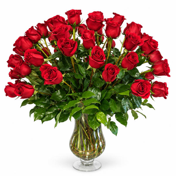 Bouquet of red roses in a clear glass vase