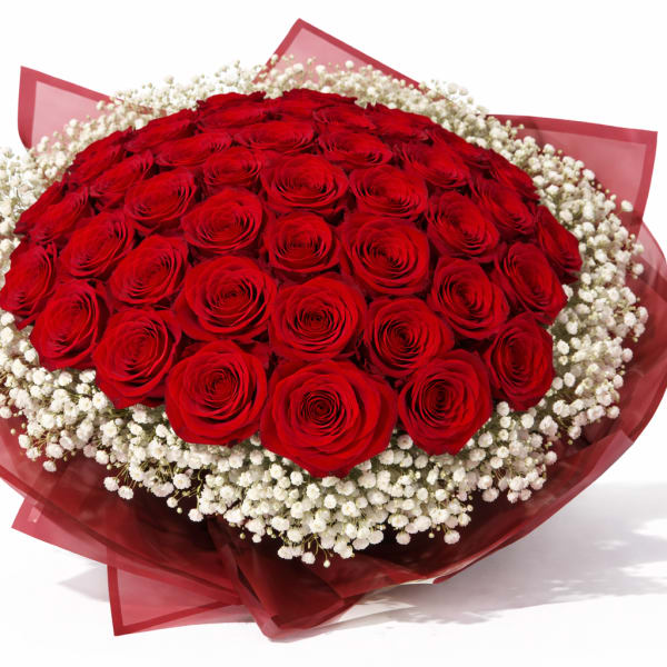 Large bouquet of red roses with white baby's breath
