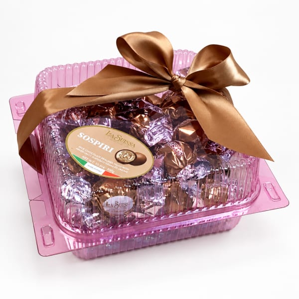Pink gift box of assorted chocolates tied with a brown satin bow