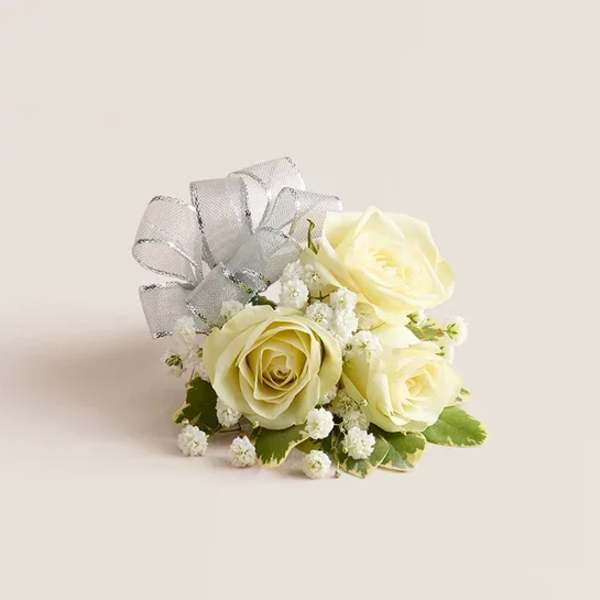 Small bouquet of cream roses with a silver ribbon