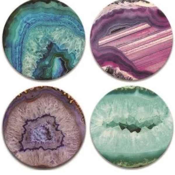Set of four round coasters featuring colorful agate-inspired patterns in teal, purple, and pink.