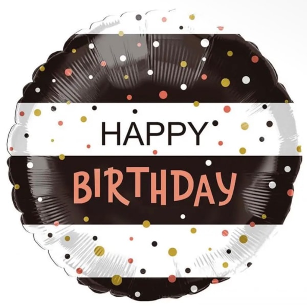 Round birthday balloon with black, white, and confetti dots