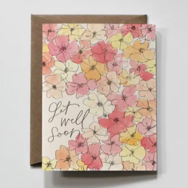 Get well soon card with pastel flower illustrations on a brown envelope