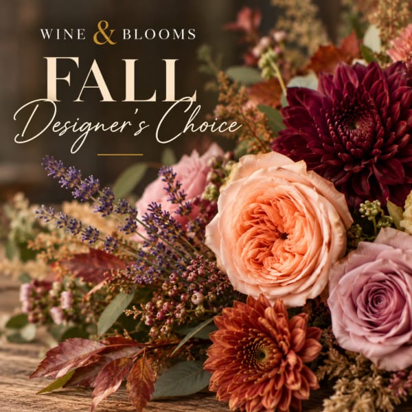 Fall floral arrangement with peach, lavender, and burgundy blooms