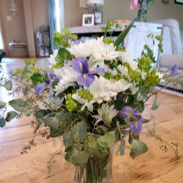 white daisies and purple iris