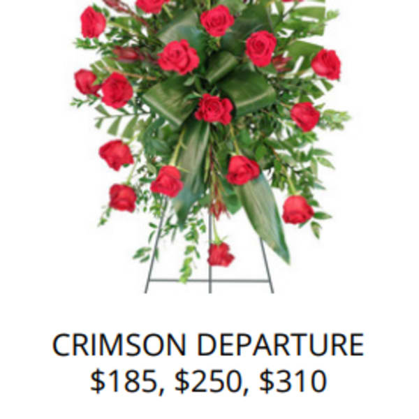 Standing spray of red roses on a metal easel