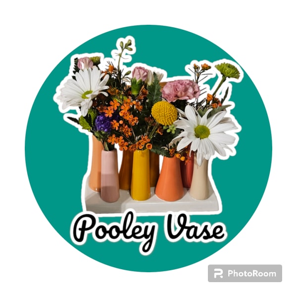 Mixed flowers arranged in colorful small vases on a teal circle background