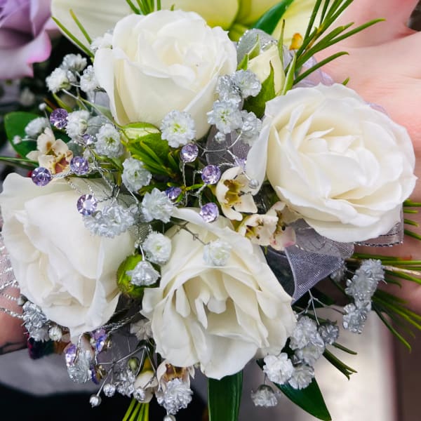 White rose bouquet with silver accents and purple gems