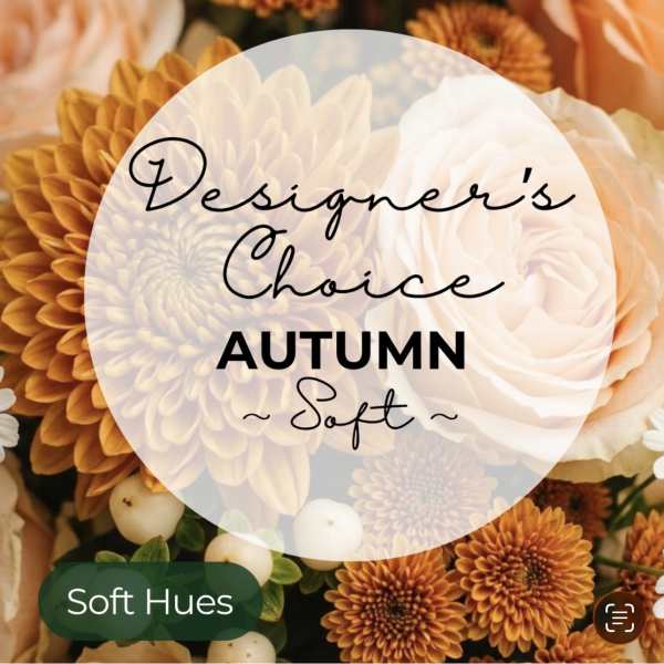 Autumn floral arrangement with orange and cream blooms and a text overlay