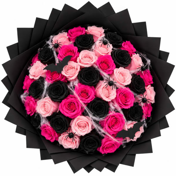Bouquet of pink and black roses with spider decorations