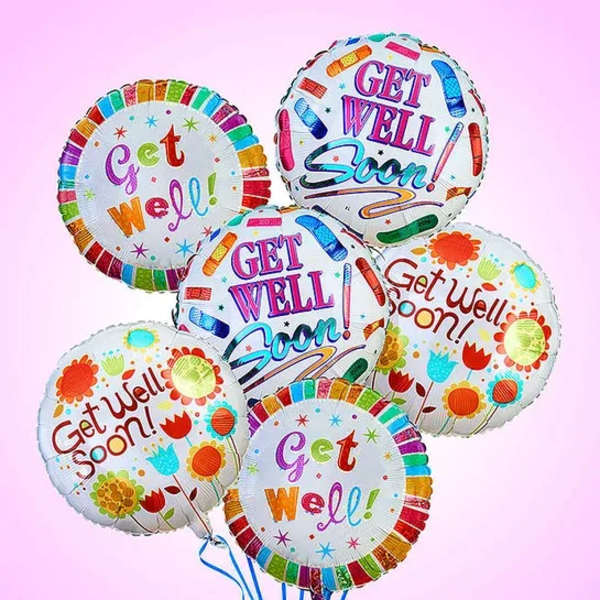 Cluster of colorful get-well balloons on a pink background
