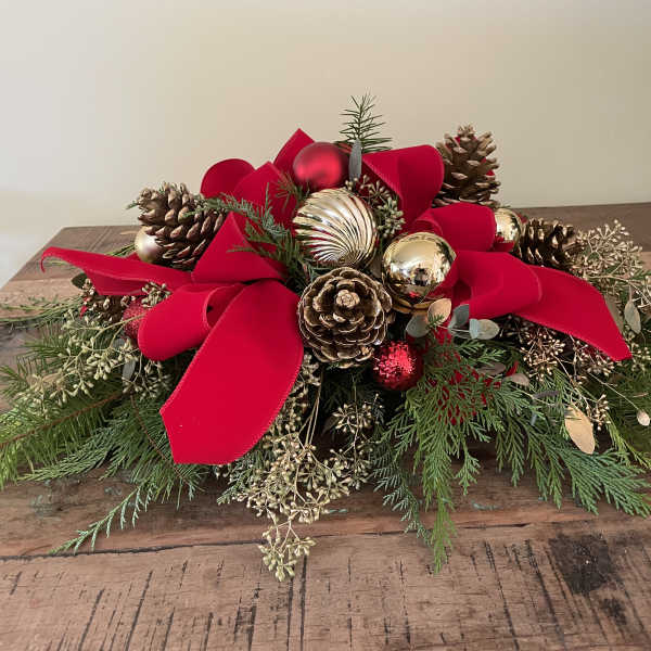 Ornaments, pinecones and ribbon