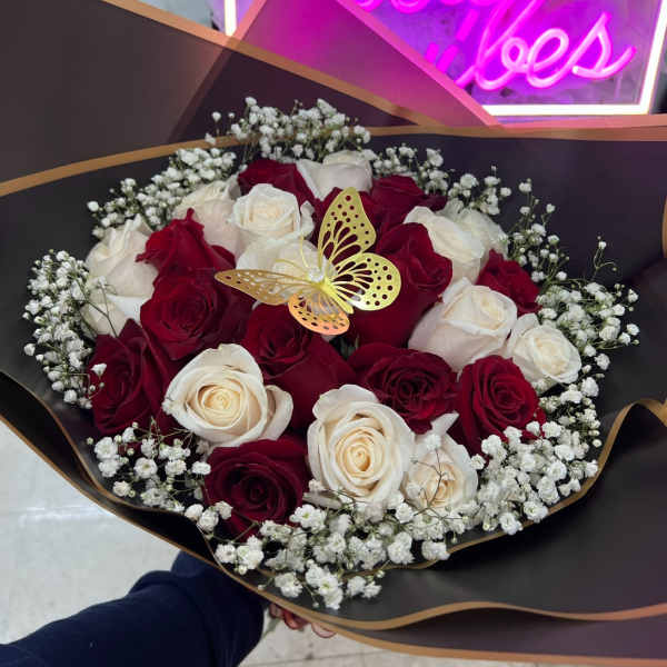 roses red and white with babies breath