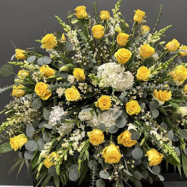 Yellow rose casket spray