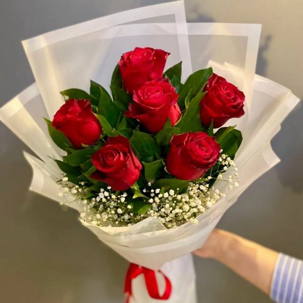 layered roses in white wrap