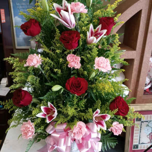 RED LILY,RED ROSES PINK CARNATIONS