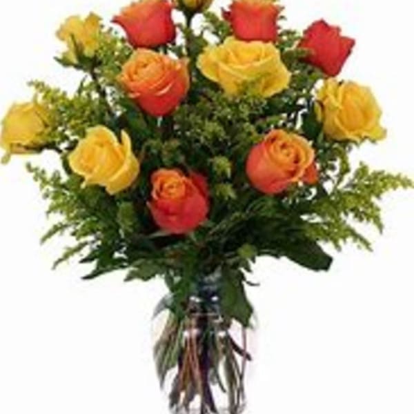Long Stem Orange and yellow roses arranged in a vase