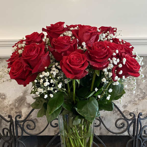 Red Rose In A Tall Vase