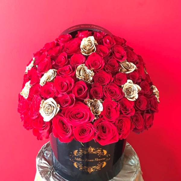 RED & GOLD ROSES IN ROUND BLACK BOX