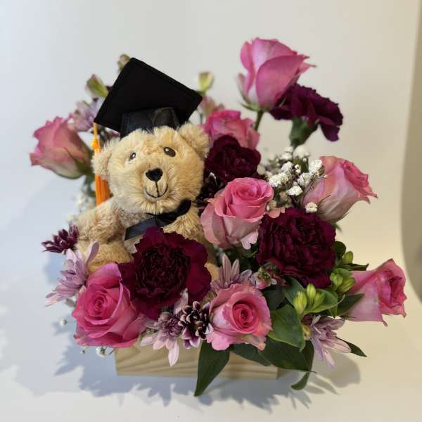 Graduations flowers with teddy