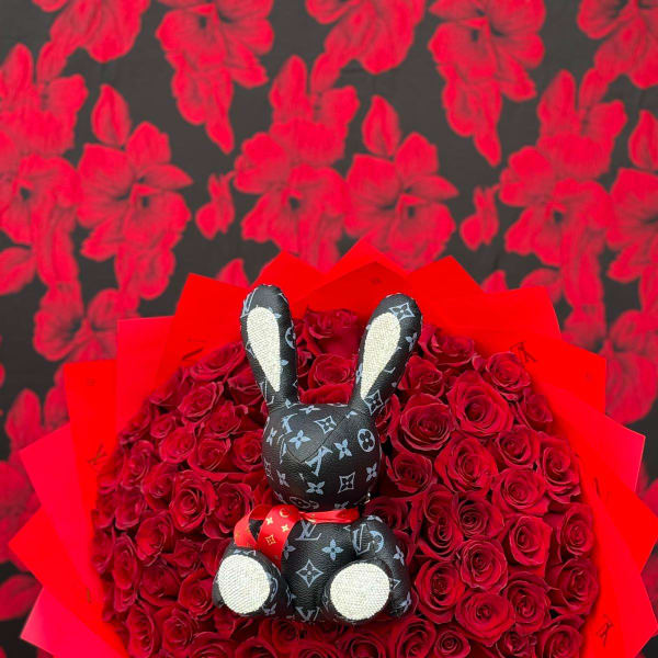 Glamour in Bloom: Red Rose Bouquet with Bunny Accent