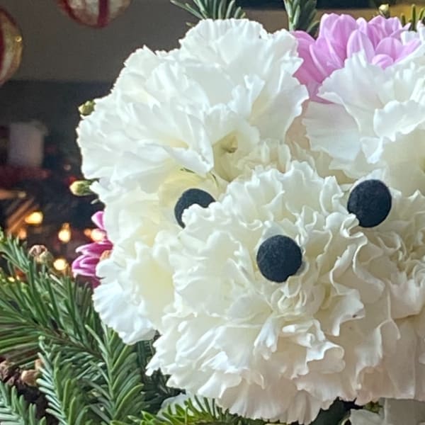 Puppy jumping out of the basket.