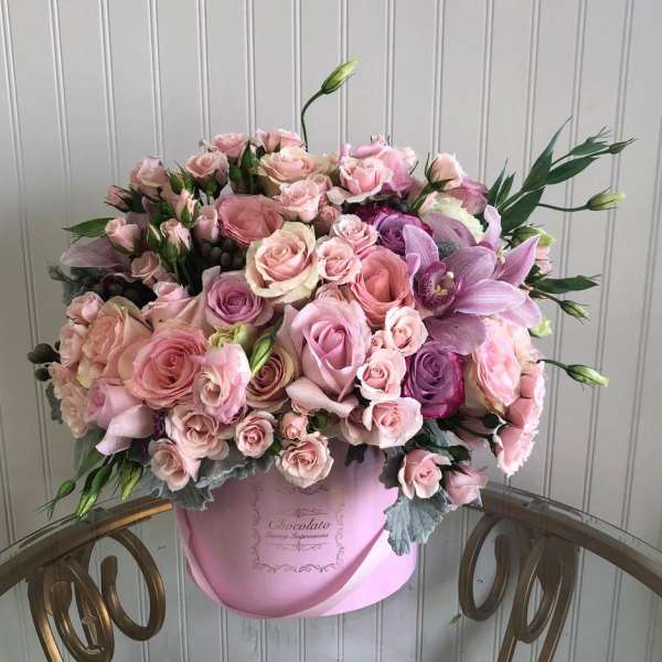 Millie - cymbidium orchid, light and dark pink roses, spray roses and dusty miller leaves