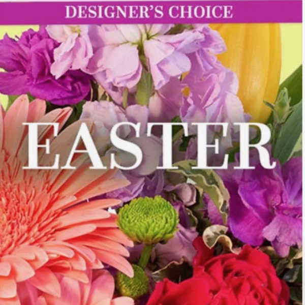 Close-up of colorful spring flowers with the word EASTER over the arrangement