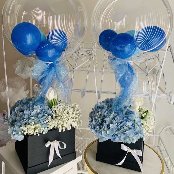 Package deal. 2 floral-balloon arrangements