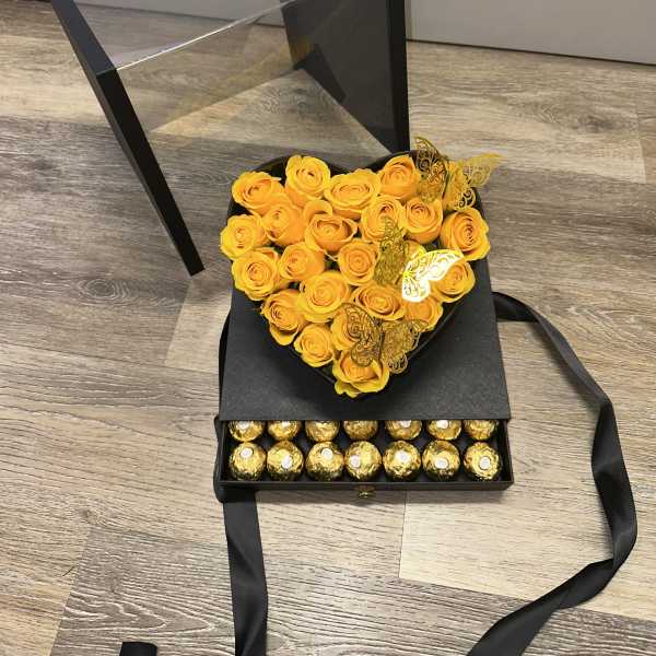 Beautiful yellow roses in an elegant acrylic box, 49 Ferrero Rocher chocolates, 3 butterflies