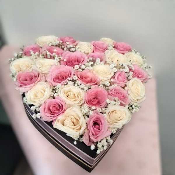 Black heart shape box with pink & white roses by Xochitl EP (specify rose color combination)