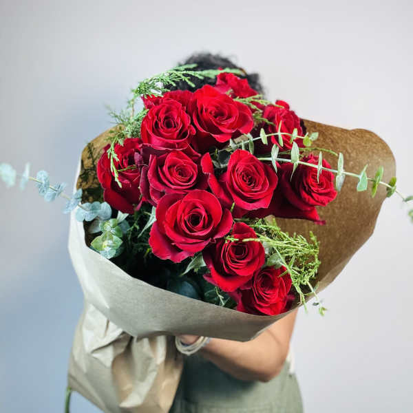 One Dozen Red Roses and Greenery - Hand Tied