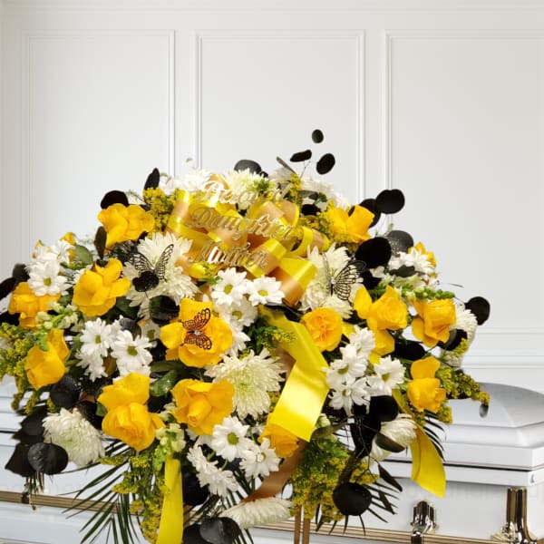 Yellow, white and black Casket