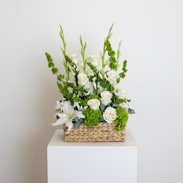 Eternal Grace Basket/ White Roses, Lilies and Bells of Ireland
