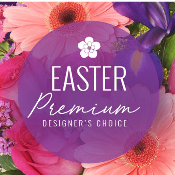 Bright Easter-themed mix of pink gerbera daisies, roses, and purple irises with a purple Easter Premium text overlay