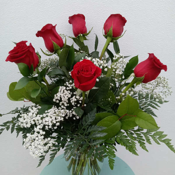 Half dozen red roses