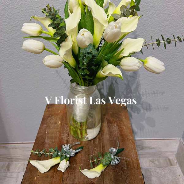 Calla lily and Tulip bridal bouquet with groom boutonniere and groomsman boutonniere