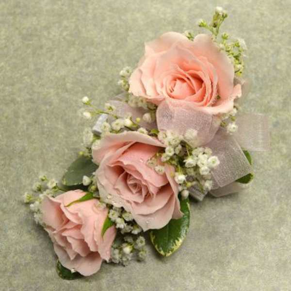Corsage with 3 Lt Pink spray Roses