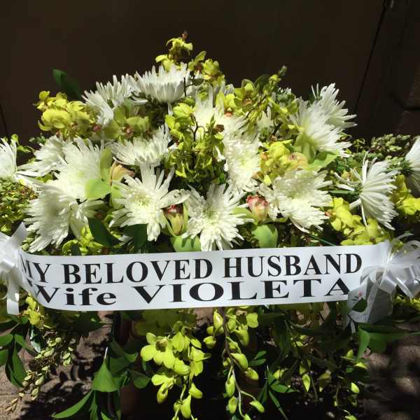 Casket arrangement of white chrysanthemum and green orchid