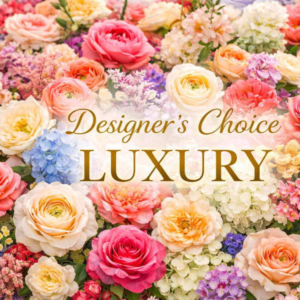 Assorted luxury roses and mixed flowers in bright and pastel colors with Designer’s Choice Luxury text in the center
