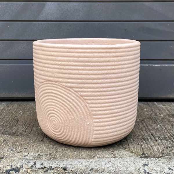 Textured blush ceramic planter pot