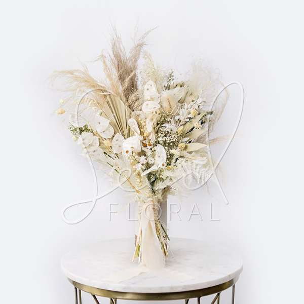 Cream and white dried bouquet with pampas grass and ribbon