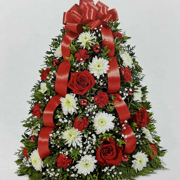 Christmas tree-shaped floral arrangement with red ribbons and red and white flowers