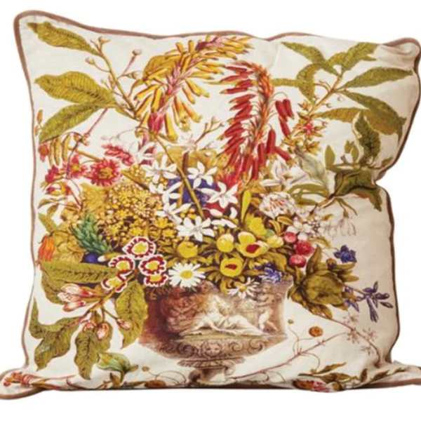 Decorative floral-print throw pillow with a vase of flowers