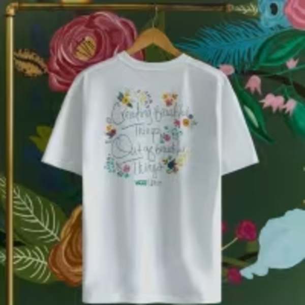 White T-shirt on a hanger with floral graphic text
