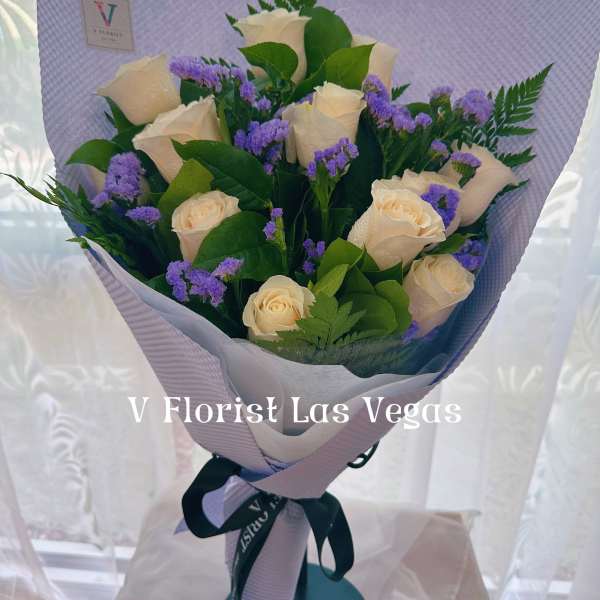 Deluxe White Roses Wrapped bouquet