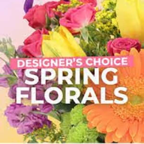 Colorful spring floral bouquet with roses, tulips, and daisies