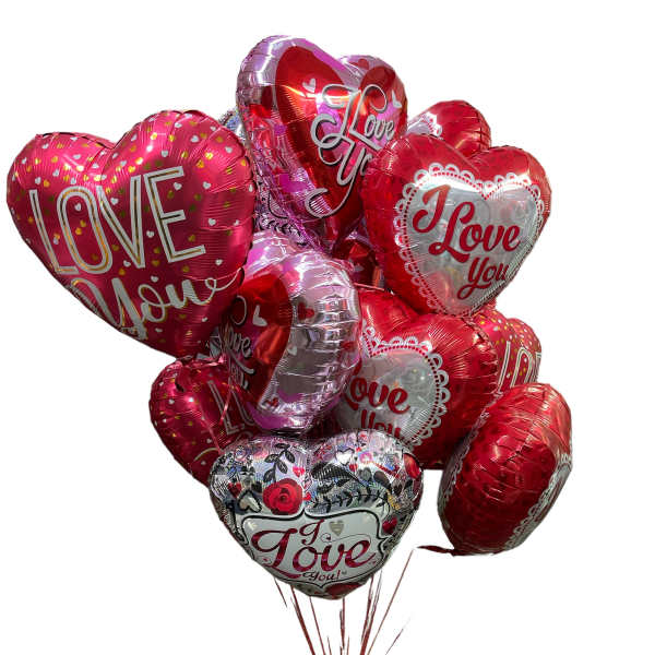 Cluster of heart-shaped red and pink balloons with love messages